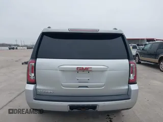 2015 GMC Yukon SLT with VIN 1GKS1BKC3FR253184, listed as a IAAI auction lot 41574610 with 152,543 mi miles. Bid and sale history available at carsss.com. Image 16.