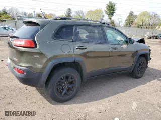 2015 Jeep Cherokee Trailhawk with VIN 1C4PJMBSXFW687205, listed as a Copart auction lot 53128545 with 86,876 mi miles and Salvage Title. Bid and sale history available at carsss.com. Image 3.