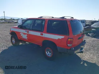 1998 Ford Explorer XL z VIN 1FMZU34E7WZB09834, wystawiony jako IAAI lot #42661901 z przebiegiem 151 236 mil mil oraz . Historia ofert i sprzedaży dostępna na DreamBid. Obrazek 3.