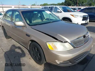 2001 Toyota Avalon XL z VIN 4T1BF28B31U185174, wystawiony jako IAAI lot #42338204 z przebiegiem 298 540 mil mil oraz . Historia ofert i sprzedaży dostępna na DreamBid. Obrazek 1.