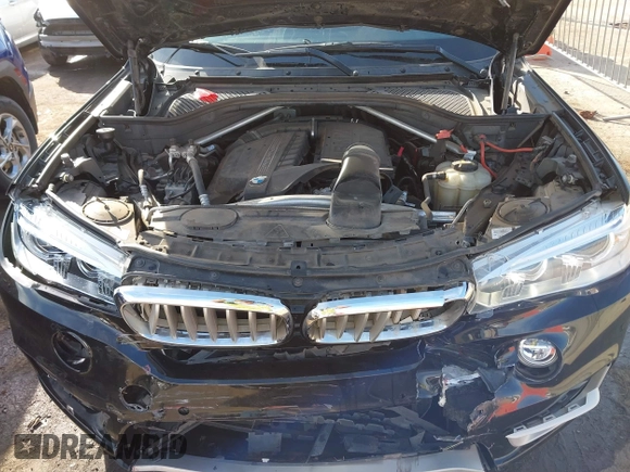 2016 BMW X5 xDrive35i with VIN 5UXKR0C54G0U11822, listed as a IAAI auction lot 41909821 with 149,460 mi miles. Bid and sale history available at carsss.com. Image 10.