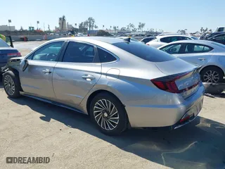 2021 Hyundai Sonata Hybrid SEL with VIN KMHL34JJ7MA026559, listed as a IAAI auction lot 41657589 with 119,019 mi miles. Bid and sale history available at carsss.com. Image 3.