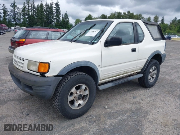 1998 Isuzu Rodeo with VIN 4S2CM57W9W4373049, listed as a IAAI auction lot 42599157 with 140,368 mi miles and . Bid and sale history available at DreamBid. Image 2.