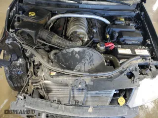 2007 Jeep Grand Cherokee SRT-8 with VIN 1J8HR78377C512937, listed as a Copart auction lot 83219784 with 158,485 mi miles and Salvage Title. Bid and sale history available at carsss.com. Image 11.