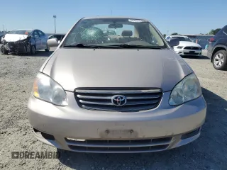 2003 Toyota Corolla CE with VIN 1NXBR38E33Z084761, listed as a Copart auction lot 55859545 with 205,938 mi miles and Salvage Title. Bid and sale history available at DreamBid. Image 5.