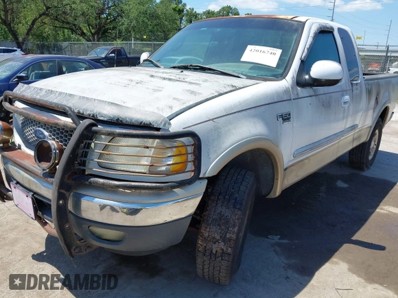 1999 Ford F-150 XL with VIN 2FTRX18L8XCB22793, listed as a IAAI auction lot 42016740 with 198,056 mi miles. Bid and sale history available at carsss.com. Image 2.