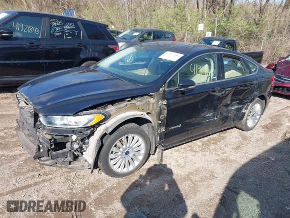 2013 Ford Fusion SE Hybrid with VIN 3FA6P0LUXDR375099, listed as a IAAI auction lot 41914387 with 133,178 mi miles. Bid and sale history available at carsss.com. Image 2.