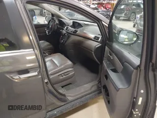 2015 Honda Odyssey EX-L with VIN 5FNRL5H64FB055890, listed as a IAAI auction lot 41706141 with 155,167 mi miles and . Bid and sale history available at carsss.com. Image 5.