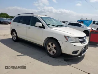 2012 Dodge Journey SXT z VIN 3C4PDCBG9CT213423, wystawiony jako Copart lot #65246735 z przebiegiem 319 806 mil mil oraz Szkoda całkowita • Salvage title. Historia ofert i sprzedaży dostępna na DreamBid. Obrazek 4.