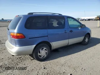 1998 Toyota Sienna LE with VIN 4T3ZF13CXWU011884, listed as a Copart auction lot 54601885 with 205,989 mi miles and Salvage Title. Bid and sale history available at carsss.com. Image 3.