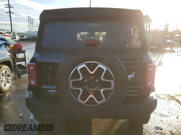 2023 Ford Bronco with VIN 1FMDE5BH9PLB30737, listed as a Copart auction lot 42602925 with 19,386 mi miles and Salvage Title. Bid and sale history available at DreamBid. Image 6.