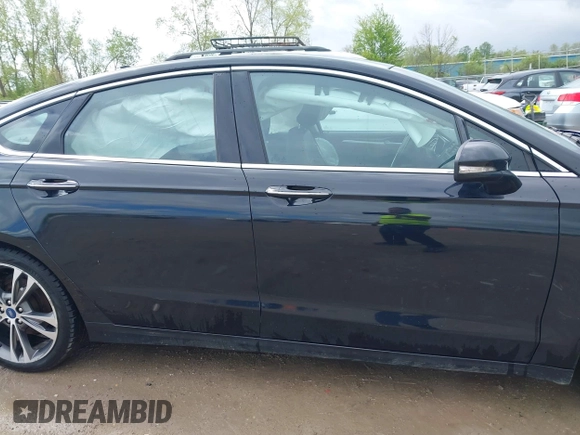 2019 Ford Fusion Titanium with VIN 3FA6P0K92KR248521, listed as a IAAI auction lot 42198307 with 51,844 mi miles and . Bid and sale history available at DreamBid. Image 13.