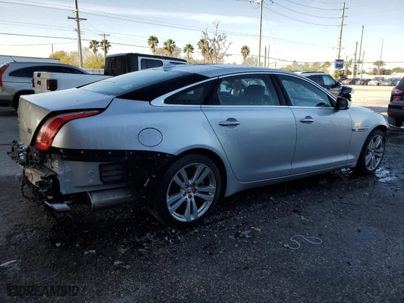 2015 Jaguar XJ with VIN SAJWJ2GD9F8V81151, listed as a Copart auction lot 45724765 with 77,392 mi miles and Salvage Title. Bid and sale history available at carsss.com. Image 3.