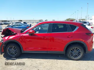 2020 Mazda CX-5 Touring with VIN JM3KFACM1L0756864, listed as a IAAI auction lot 41761131 with 16,646 mi miles and . Bid and sale history available at carsss.com. Image 14.