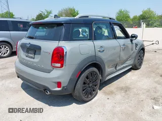 2020 MINI Countryman Cooper S with VIN WMZYX1C08L3L66257, listed as a IAAI auction lot 42402345 with 28,609 mi miles and . Bid and sale history available at DreamBid. Image 4.