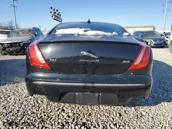 2015 Jaguar XJ with VIN SAJWA1CZ8F8V85381, listed as a Copart auction lot 42592495 with 161,938 mi miles and Salvage Title. Bid and sale history available at carsss.com. Image 6.