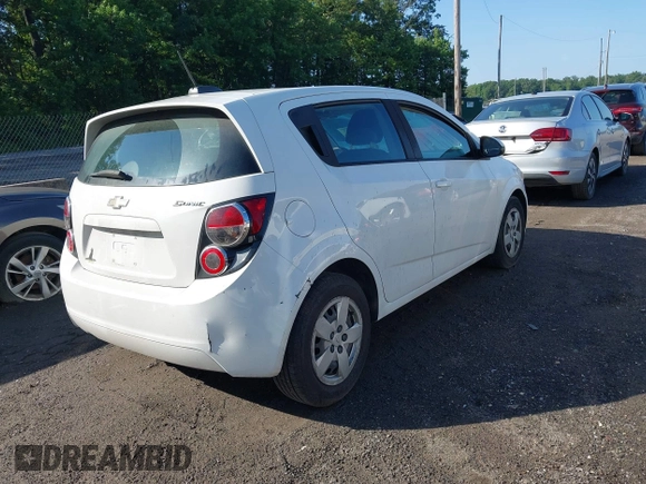2015 Chevrolet Sonic LS with VIN 1G1JA6SG8F4131976, listed as a IAAI auction lot 42552157 with 99,575 mi miles and . Bid and sale history available at DreamBid. Image 4.