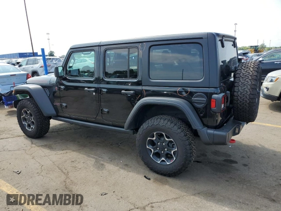 2023 Jeep Wrangler Rubicon with VIN 1C4HJXFG9PW561091, listed as a Copart auction lot 62660834 with 12,081 mi miles and Non Repairable. Bid and sale history available at DreamBid. Image 2.