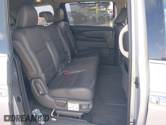2011 Honda Odyssey Touring with VIN 5FNRL5H92BB049901, listed as a IAAI auction lot 41985224 with 101,957 mi miles and . Bid and sale history available at DreamBid. Image 8.