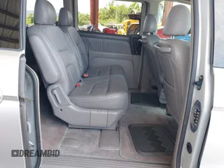 2003 Honda Odyssey EX-L z VIN 5FNRL18933B087714, wystawiony jako IAAI lot #42510813 z przebiegiem 145 360 mil mil oraz . Historia ofert i sprzedaży dostępna na DreamBid. Obrazek 8.