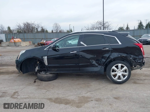 2015 Cadillac SRX Premium Collection with VIN 3GYFNGE37FS556860, listed as a IAAI auction lot 41854634 with 170,808 mi miles and . Bid and sale history available at DreamBid. Image 14.