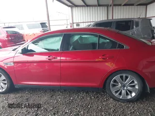 2012 Ford Taurus Limited z VIN 1FAHP2FW7CG109370, wystawiony jako IAAI lot #42204156 z przebiegiem 137 942 mil mil oraz . Historia ofert i sprzedaży dostępna na DreamBid. Obrazek 14.