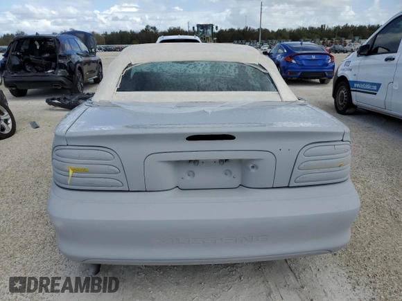 1995 Ford Mustang with VIN 1FALP4444SF177184, listed as a Copart auction lot 78695874 with 119,729 mi miles and Salvage title. Bid and sale history available at DreamBid. Image 6.