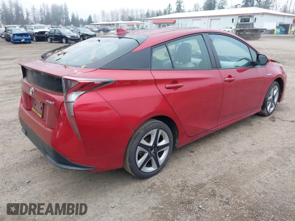 2017 Toyota Prius Two with VIN JTDKARFUXH3531849, listed as a IAAI auction lot 41301786 with 92,163 mi miles. Bid and sale history available at carsss.com. Image 4.