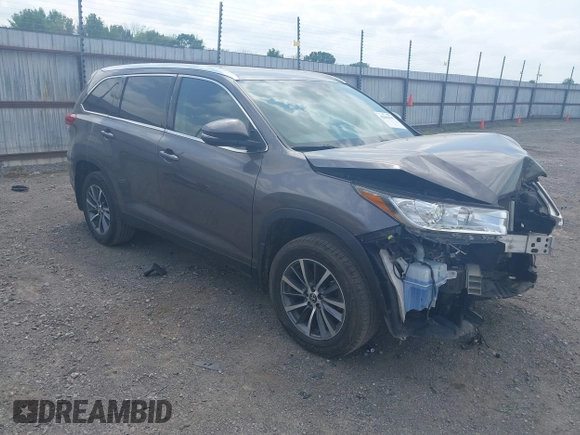 2019 Toyota Highlander SE with VIN 5TDKZRFH3KS353087, listed as a IAAI auction lot 42006593 with 74,214 mi miles and . Bid and sale history available at DreamBid. Image 1.
