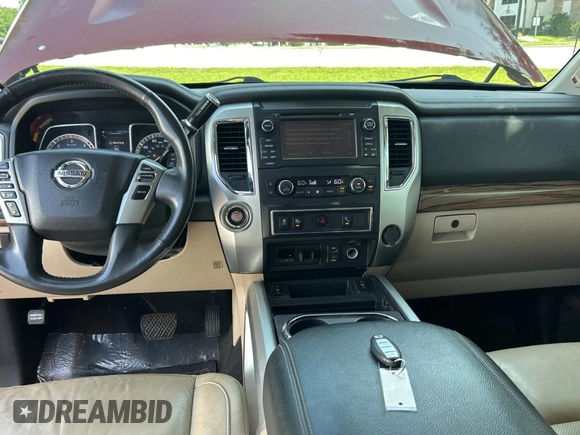 2016 Nissan Titan SL z VIN 1N6BA1F26GN512666, wystawiony jako Copart lot #59731495 z przebiegiem 120 182 mil mil oraz Czysty tytuł • Clean title. Historia ofert i sprzedaży dostępna na DreamBid. Obrazek 9.