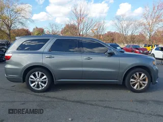 2011 Dodge Durango Heat with VIN 1D4RE3GG8BC733088, listed as a IAAI auction lot 40764161 with 149,846 mi miles. Bid and sale history available at carsss.com. Image 13.