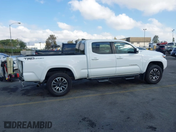 2020 Toyota Tacoma SR5 with VIN 3TMBZ5DN7LM026596, listed as a IAAI auction lot 40705410 with 123,489 mi miles and . Bid and sale history available at DreamBid. Image 14.