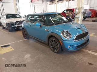 2013 MINI Hardtop S with VIN WMWSV3C55DT388606, listed as a IAAI auction lot 42363464 with 65,255 mi miles and . Bid and sale history available at DreamBid. Image 1.
