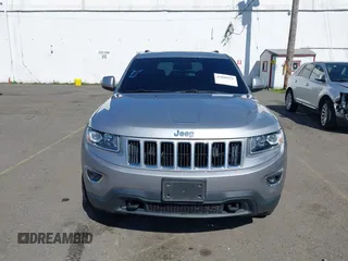 2016 Jeep Grand Cherokee Laredo z VIN 1C4RJFAG7GC392261, wystawiony jako IAAI lot #41890922 z przebiegiem 107 546 mil mil oraz . Historia ofert i sprzedaży dostępna na DreamBid. Obrazek 12.