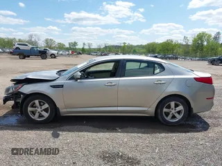 2015 Kia Optima LX z VIN 5XXGM4A70FG392359, wystawiony jako IAAI lot #42232025 z przebiegiem 192 636 mil mil oraz . Historia ofert i sprzedaży dostępna na DreamBid. Obrazek 15.