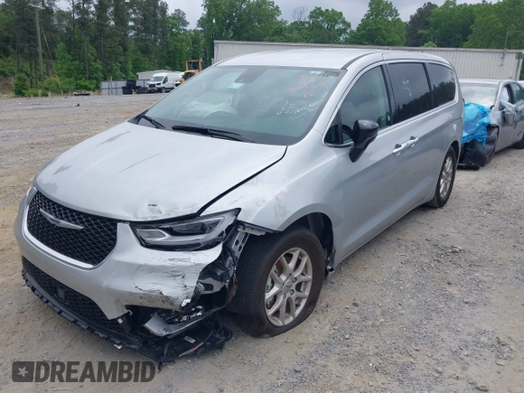 2024 Chrysler Pacifica Touring L with VIN 2C4RC1BG8RR139066, listed as a IAAI auction lot 42150531 with 18,777 mi miles and . Bid and sale history available at DreamBid. Image 2.