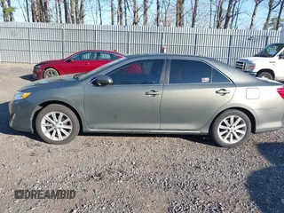 2014 Toyota Camry L with VIN 4T4BF1FK6ER393445, listed as a IAAI auction lot 42044946 with 130,169 mi miles. Bid and sale history available at carsss.com. Image 14.