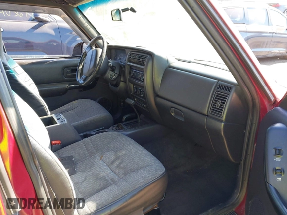 1999 Jeep Cherokee Sport with VIN 1J4FF68S4XL552718, listed as a IAAI auction lot 41443871 with 310,874 mi miles and . Bid and sale history available at DreamBid. Image 5.