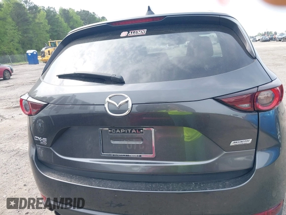 2017 Mazda CX-5 Touring z VIN JM3KFBCL4H0178747, wystawiony jako IAAI lot #42041380 z przebiegiem 112 083 mil mil oraz . Historia ofert i sprzedaży dostępna na DreamBid. Obrazek 16.