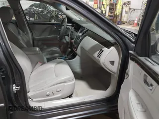 2010 Cadillac DTS w/1SC with VIN 1G6KD5EY7AU125289, listed as a IAAI auction lot 41836355 with 135,784 mi miles. Bid and sale history available at carsss.com. Image 5.