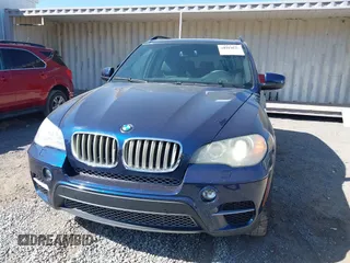 2012 BMW X5 50i with VIN 5UXZV8C57CL423223, listed as a IAAI auction lot 42606594 with 94,695 mi miles and . Bid and sale history available at DreamBid. Image 6.