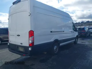 2023 Ford Transit Cargo with VIN 1FTBR3U88PKA07731, listed as a IAAI auction lot 41781986 with 37,044 mi miles and . Bid and sale history available at DreamBid. Image 4.