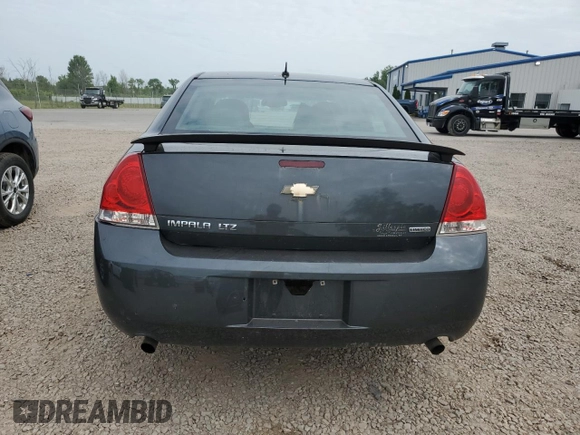 2014 Chevrolet Impala LTZ with VIN 2G1WC5E3XE1185115, listed as a Copart auction lot 60690785 with 119,947 mi miles and Salvage title. Bid and sale history available at DreamBid. Image 6.