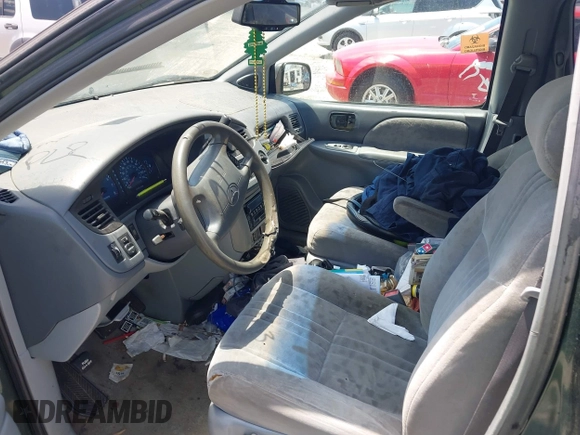 2002 Toyota Sienna LE with VIN 4T3ZF13C82U465948, listed as a IAAI auction lot 42264013 with 228,864 mi miles and . Bid and sale history available at DreamBid. Image 5.