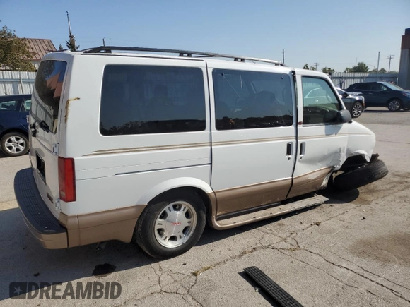 2003 GMC Safari z VIN 1GKEL19X03B503236, wystawiony jako Copart lot #71755844 z przebiegiem 109 438 mil mil oraz Szkody całkowita. Historia ofert i sprzedaży dostępna na DreamBid. Obrazek 3.