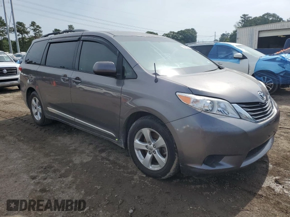 2014 Toyota Sienna LE AAS with VIN 5TDKK3DCXES491979, listed as a Copart auction lot 58493005 with 165,975 mi miles and Salvage title. Bid and sale history available at DreamBid. Image 4.