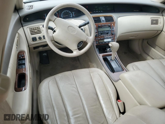 2000 Toyota Avalon XL z VIN 4T1BF28B8YU008033, wystawiony jako Copart lot #45644285 z przebiegiem 144 772 mil mil oraz Szkoda całkowita • Salvage title. Historia ofert i sprzedaży dostępna na DreamBid. Obrazek 8.