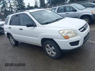 2009 Kia Sportage LX z VIN KNDJF724X97575853, wystawiony jako IAAI lot #41844380 z przebiegiem 96 940 mil mil oraz . Historia ofert i sprzedaży dostępna na DreamBid. Obrazek 1.