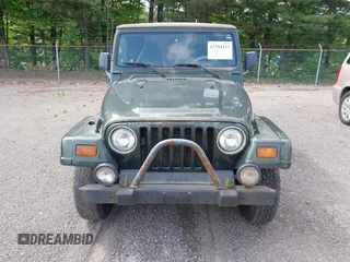 1998 Jeep Wrangler Sahara z VIN 1J4FY49SXWP716218, wystawiony jako IAAI lot #42354433 z przebiegiem 234 378 mil mil oraz . Historia ofert i sprzedaży dostępna na DreamBid. Obrazek 6.