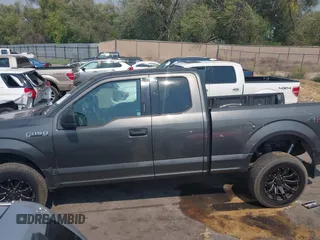 2016 Ford F-150 XLT with VIN 1FTEX1E80GKD98282, listed as a IAAI auction lot 40317900 with 159,605 mi miles. Bid and sale history available at carsss.com. Image 14.